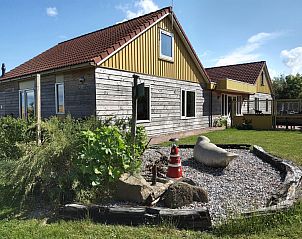 Auenansicht der Ferienhuser De Triaan, Ferienhaus in Zuid-Eierland, Texel mit Ziergarten.