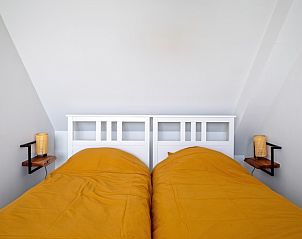 Gemtliches Schlafzimmer im Ferienhaus De Noordbunder, Zuid-Eierland, Texel mit bequemen Betten.