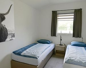 Modernes Schlafzimmer im Ferienhaus 3901 Farm Leiden, Sd-Eierland, Texel.