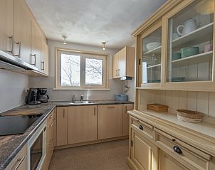 Volledig uitgeruste keuken van Huisje 7 in De Dennen, Texel, perfect voor het bereiden van heerlijke maaltijden op de Waddeneilanden.