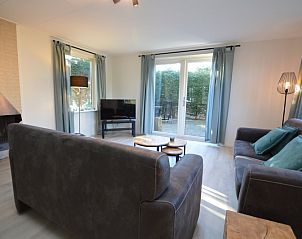 Gemtliche Sitzecke im Ferienhaus Bungalowpark Vredelust, De Dennen, Texel, ideal zum Entspannen nach einem Tag voller Entdeckungen.