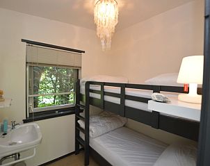 Knusse kinderkamer met stapelbed in Vakantiehuis 't Hoogelandt 202 - Aan Zee, Texel, perfect voor gezinnen.