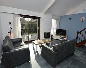 Gemtliches Wohnzimmer im Ferienhaus Gortersmient 240, Bungalowpark Gortersmient, De Dennen Texel mit moderner Einrichtung.