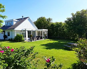 Ferienhaus Bungalowpark De Parel - WELMOED auf Texel, umgeben von Natur und Ruhe.