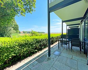 Buitenruimte van Appartement Bos en Duin 15, De Dennen, Texel met prachtig uitzicht over de Texelse natuur.