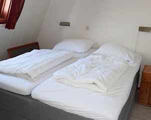Gerumiges Schlafzimmer im Ferienhaus Gortersmient 246, De Dennen, Texel, Waddeninseln.