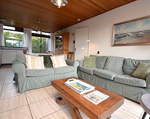 Offene Kche und Sitzecke im Ferienhaus de Parel 258, De Dennen, Texel, mit viel Tageslicht.