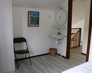 Attraktiver Innenbereich des Ferienhauses Gortersmient 216, De Dennen, Texel, Waddeninseln, mit moderner Ausstattung.