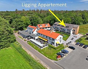 Aerial view of Apartment Bos en Duin 34, De Dennen, Texel with green surroundings.