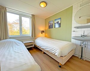 Gerumiger Balkon des Appartements Bos en Duin 21, De Dennen, Texel mit schner Aussicht ber die Felder.