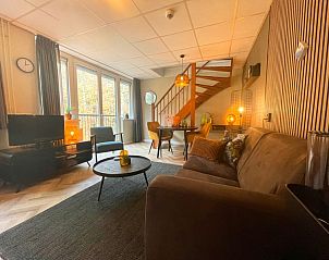 Ruime woonkamer in Appartement Bos en Duin 24, De Dennen, Texel. Comfortabel vakantiehuis op de Waddeneilanden.