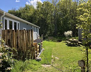Vakantiepark de Bremakker - Bosveld 103, vakantiehuis in De Dennen, Texel met zonnige tuin en terras omringd door natuur.