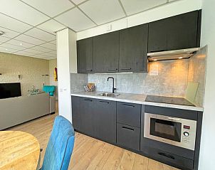 Slaapkamer van Appartement Bos en Duin 16 in De Dennen Texel met comfortabele bedden en rustige sfeer.