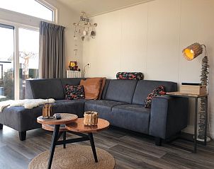 Comfortabele zithoek in vakantiehuis Vakantiepark de Bremakker - Bosveld 121, De Dennen, Texel.