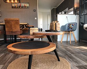 Interieur met gezellige zithoek in Vakantiehuis Vakantiepark de Bremakker - Bosveld 121, De Dennen, Texel.