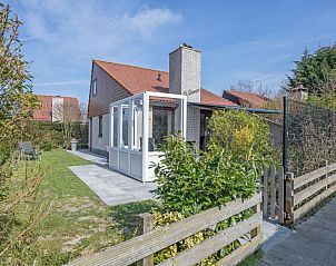 Vakantiehuis Gortersmient 228 in De Dennen Texel met zonnig terras en groene tuin.
