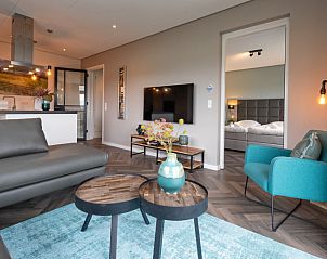 Gemtliche Sitzecke im Apartment Bos en Duin 01, De Dennen, Texel mit komfortablen Mbeln.