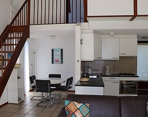 Offene Kche und Essbereich im Ferienhaus Gortersmient 260, De Dennen, Texel, fr einen komfortablen Aufenthalt.