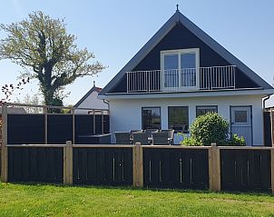 Helianthus vakantiehuis in De Dennen Texel met ruime veranda en balkon voor ontspanning in de natuur.