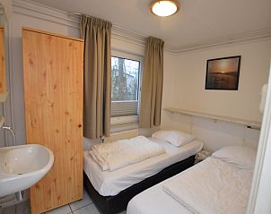 Schlafzimmer mit zwei Betten im Ferienhaus Tempelierweg 37, De Dennen, Texel, ruhige Atmosphre.