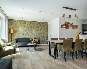 Stilvolles Wohnzimmer im Ferienpark De Koorn-aar Villa, Texel mit gemtlicher Sitzecke.