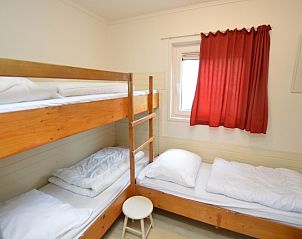 Gemtliches Schlafzimmer mit Etagenbett im Ferienhaus de Parel 206 in De Dennen, Texel fr Kinder.