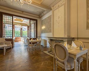 Stijlvolle eetruimte met authentieke details in Hotel Bigarr Maastricht Centrum, vakantieappartement in Zuid Limburg.