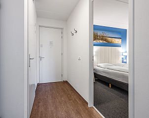 Terras van Vlieduyn 2-4-persoons appartement in Oost-Vlieland, met uitzicht op de duinen.