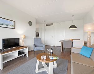 Comfortabele slaapkamer in Vlieduyn 2-persoons appartement, Oost-Vlieland, met zachte bedden en modern interieur.