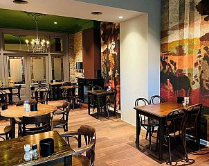 Elegante eetzaal in Loods Hotel Vlieland, vakantieappartement op Vlieland, met sfeervolle inrichting.