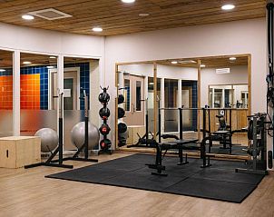 Fitnessruimte in Vlierijck vakantieappartement op Vlieland met moderne apparatuur.