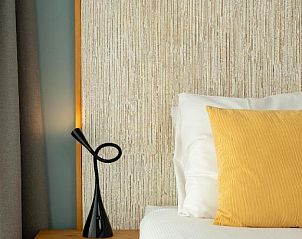 Slaapkamer in Vlierijck vakantieappartement op Vlieland met moderne inrichting.