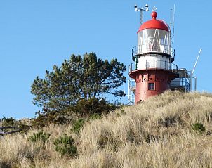 Vuurtoren op Vlieland, een iconisch uitzicht nabij Hotel DoniaState, vakantieappartement op de Waddeneilanden.