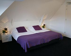 Comfortabele slaapkamer in De Herbergh van Flielant, vakantieappartement in Vlieland, Waddeneilanden.