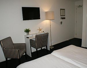 Gezellige zithoek in De Herbergh van Flielant, vakantieappartement in Vlieland, Waddeneilanden.