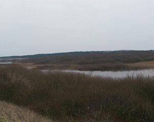 Uitzicht over duinlandschap bij Amelander Kaap Appartement 112, Hollum, Ameland.