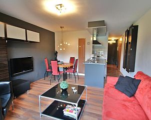 Gemtliches Wohnzimmer der Ferienwohnung APHRODITE, Hollum, Ameland, mit moderner Einrichtung.