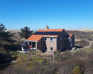 Huisje in West aan Zee, een charmant vakantiehuis op Terschelling, omgeven door duinen en natuur, ideaal voor een ontspannen verblijf.