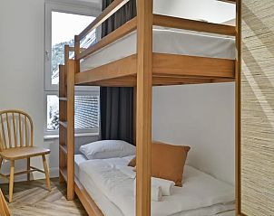 Knusse slaapkamer met stapelbed in het 4-6L appartement, Terschelling, Waddeneilanden.