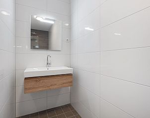 Stijlvolle binnenruimte van het 4-persoons appartement 4C2 in West-Terschelling, Terschelling, met moderne inrichting.