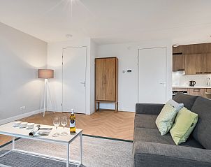 Comfortabele slaapkamer in het 4-persoons appartement 4C2, West-Terschelling, Terschelling, met uitzicht op de omgeving.