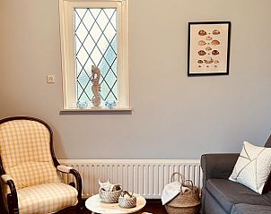 Stilvolle Sitzecke im Akkerduin Ferienhaus Ballum, Ameland mit gemtlicher Einrichtung und Dekoration auf den Watteninseln.