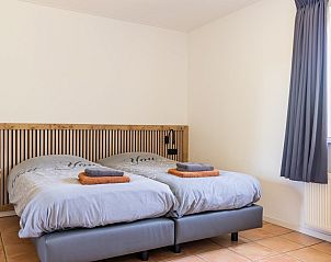 Gemtliches Schlafzimmer im Ferienhaus Arcoz, Ballum, Ameland mit Doppelbett.