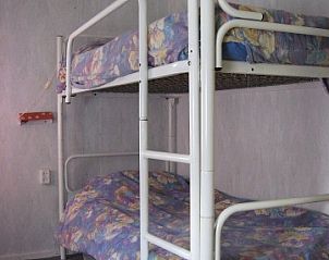 Gemtliches Schlafzimmer mit Etagenbett im Ferienhaus Poolster, Buren, Ameland. Ideal fr Familien auf den Watteninseln.