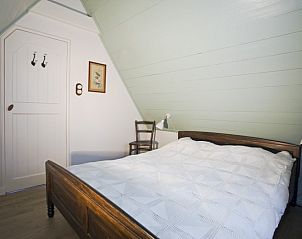 Gezellige slaapkamer in Beppe van Ameland vakantiehuis, Hollum, Ameland.