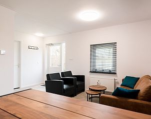 Gezellige zithoek in vakantiehuis Onder de Pannen! op Ameland, Waddeneilanden.