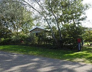 Vacation home Strandloper hidden among trees in Hollum, Ameland.