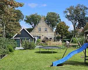 Vakantiehuis FR402 in Hollum, Ameland met ruime tuin en speeltoestellen op de Waddeneilanden.