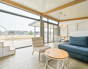 Binnenruimte van Vrijstaande woning in Hollum, Ameland met ruime woonkamer.