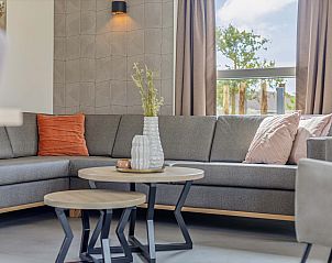 Sfeervolle zitruimte in Vrijstaande woning in Hollum, Ameland, vakantiehuis met moderne inrichting op de Waddeneilanden.